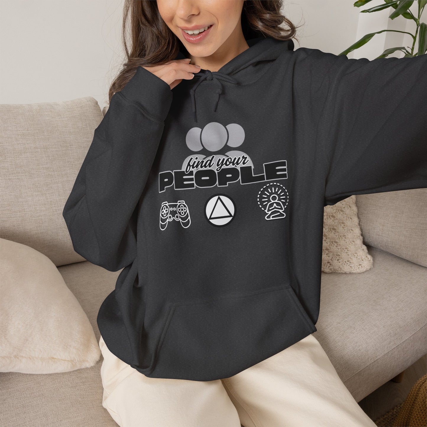 Person wearing the Find Your People Hoodie with clean community-focused lettering and symbols